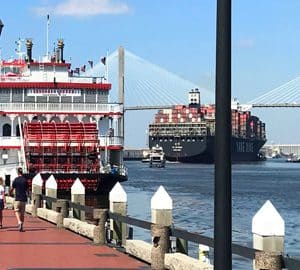 Welcome To Historic Savannah! big paddle boat red brick street with people walking